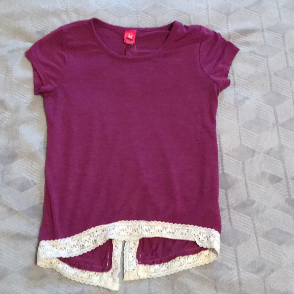 I am selling a magenta shirt.